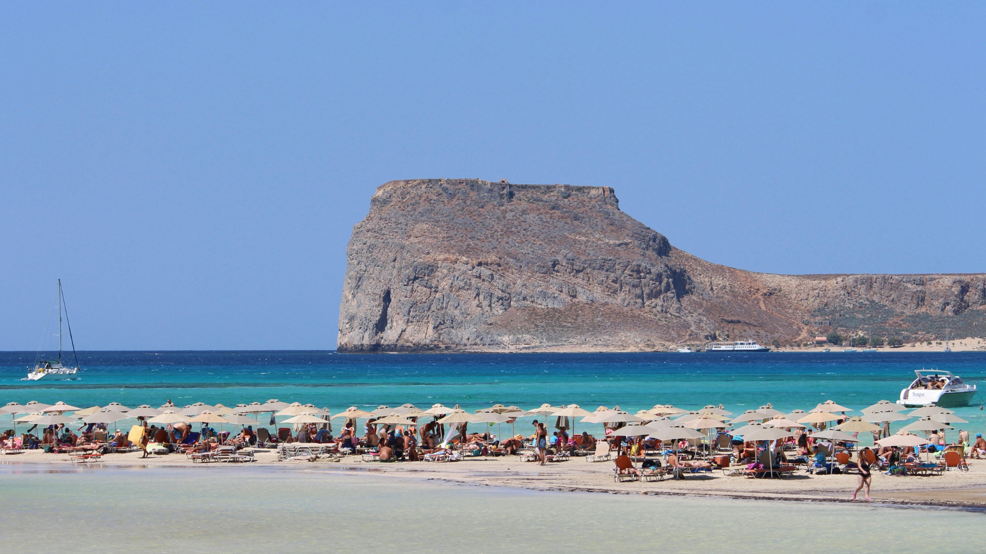 crete beach and crowd